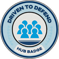 Driven to Defend Hub Badge