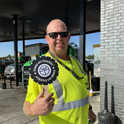 A driver at Love's in Oklahoma poses for a picture for National Truck Driver Appreciation Week