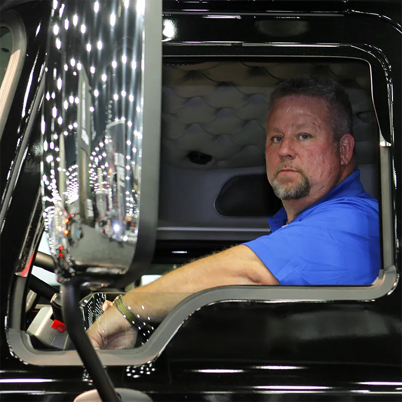 Steve Brand in a semi truck window