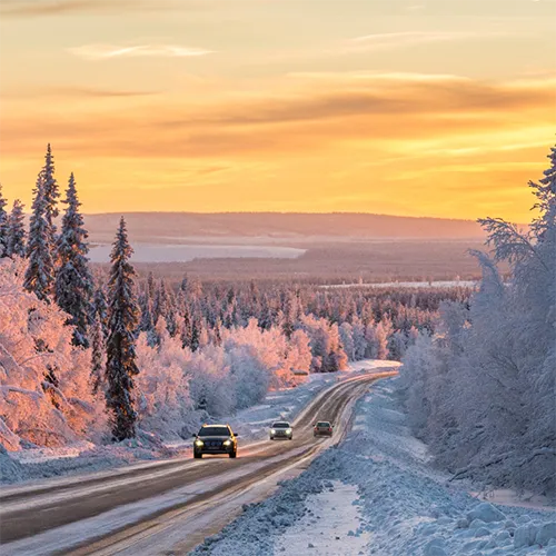 Winter road with cars